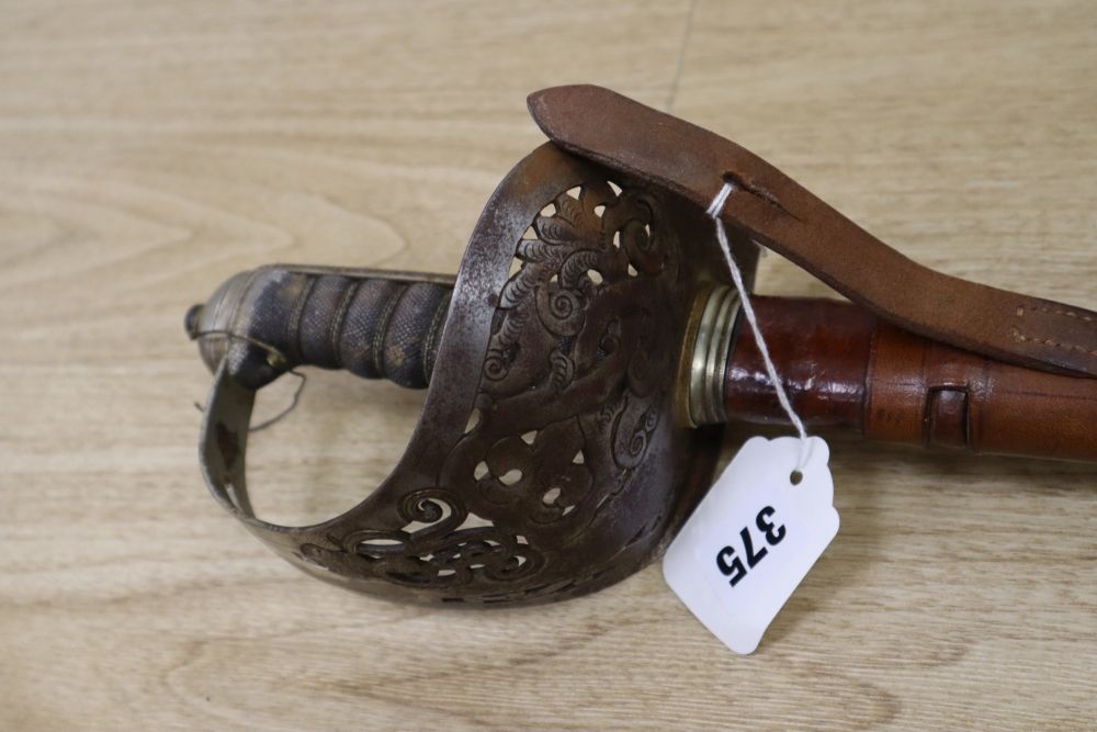 A George V officers dress sword, with leather scabbard, 100cm